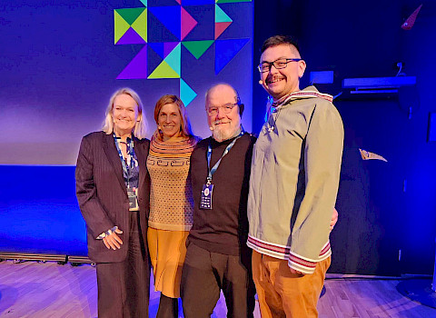 Josh Komangapik with CAFF colleagues (Inge Thaulow, former CAFF Chair; Lauren Divine, Aleut International Association; Donald McLennan, CBMP Canada) at the Ecosystems Approach conference in Tromso Norway, April 2024
